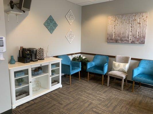 Our colorful and elegant waiting room with complimentary tea and coffee