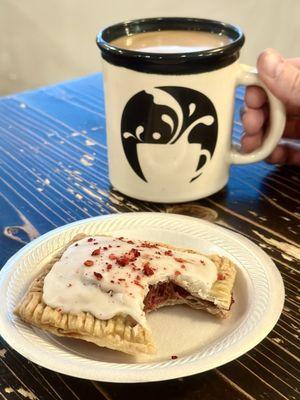 Home made in-house pastry strawberry pop-tart and a pour over coffee.