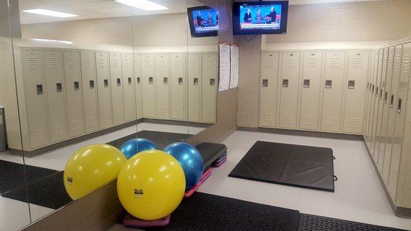 Stretching area in the ladies locker room.