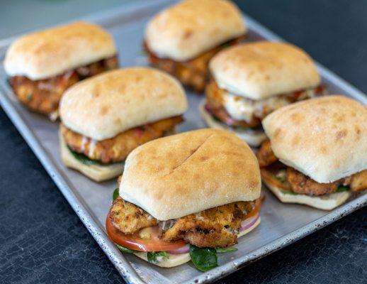 Chicken Parmesan Sandwich. Served with sweet potato fries or mixed green salad.