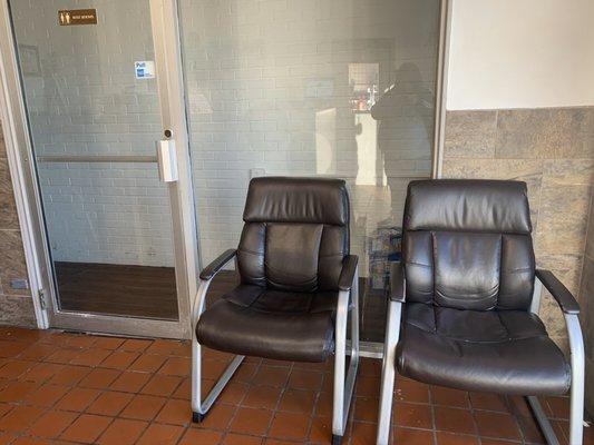 At least four chairs in the waiting area.