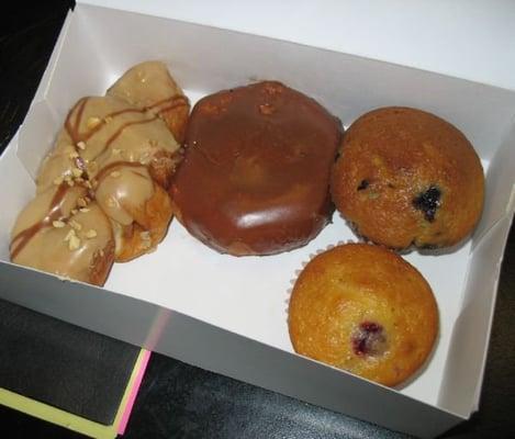 Peanut butter twister, chocolate glazed donut, blueberry and muffins