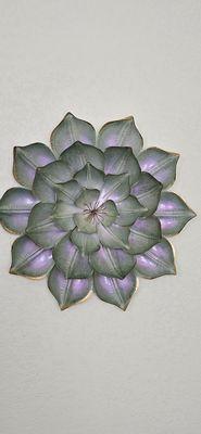 This is a lotus flower. It is a symbol of purity and wholesomeness.