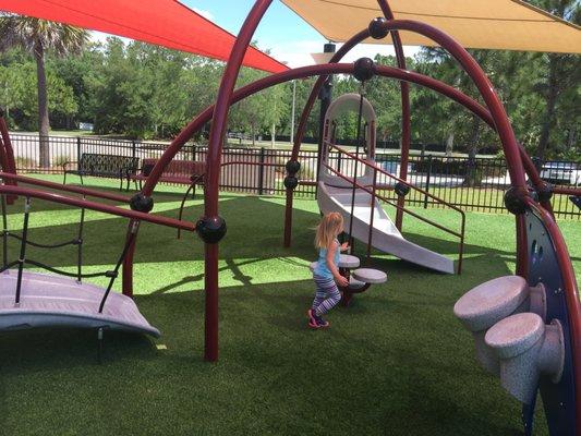 Great fenced in park for all ages.  It has sun shades over most of the playground.