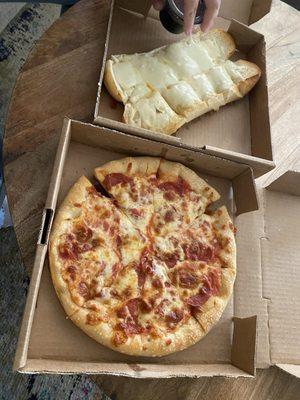 Pepperoni pizza and cheese bread