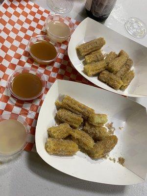 Churros and dipping sauce! The white chocolate is my favorite.