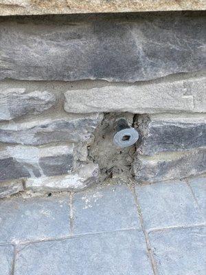 Damaged stone around the gas valve for our fire feature that they never addressed