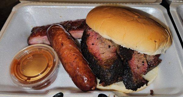 Brisket sandwich and sausage