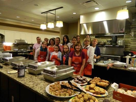 CARA team members and their family members volunteering to prepare and serve brunch at the Ronald McDonald House near Lurie Children's.