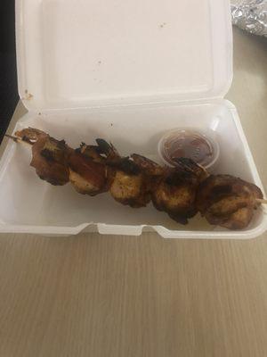 Hog shrimp. Jumbo shrimp stuffed with scallops wrapped in bacon.