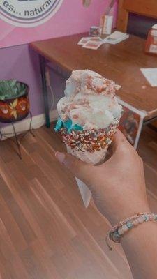 Chocolate dipped cone with sprinkles. Strawberry cheesecake ice cream and Cookie Monster ice cream