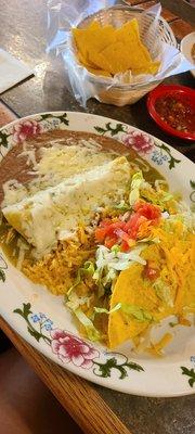 Enchilada with green sauce and a taco