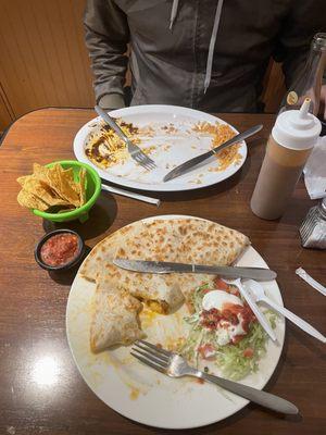 My delicious chicken quesadilla and his all gone steak