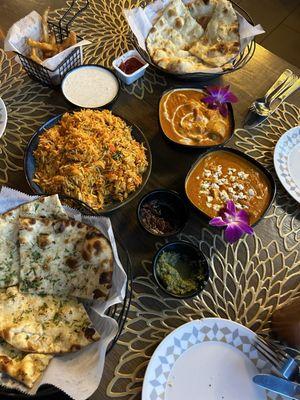 Garlic Naan, Butter Naan, Shrimp Biryani, Masala Fries, chutney, Butter Paneer Masala, Chicken Tikka Masala