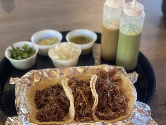 One taco de cabeza and two mixed (carnitas & cueretos)