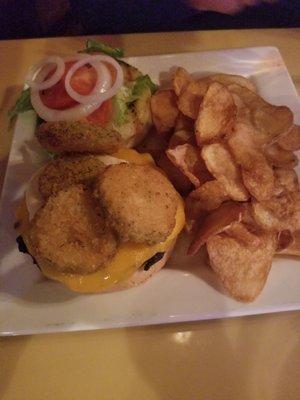 Burger with fried pickles and homemade goodness chips!