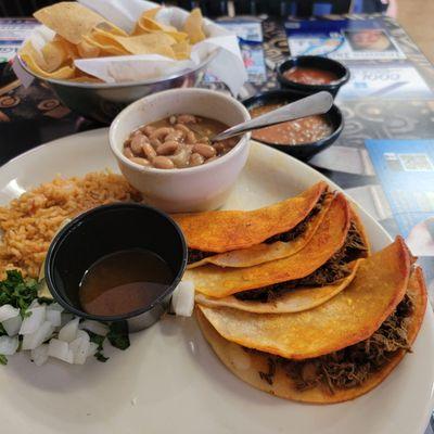 3 beef birria tacos, meat & melted cheese, you add fixings, dip in au jus consumme in cup. Mmmm!