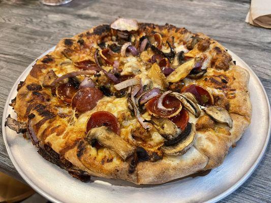 9/13/23 Stuffed crust with inferno sauce, chicken sausage, pepperoni, onions, mushrooms, and hot honey