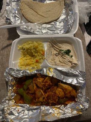 Spicy Mediterranean Chicken with hummus, pita bread and yellow rice!