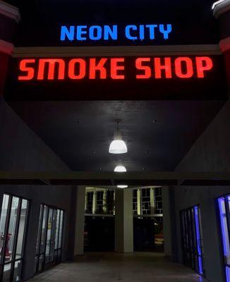 Neon City Smoke Shop located in little alley at Rocksprings Plaza!