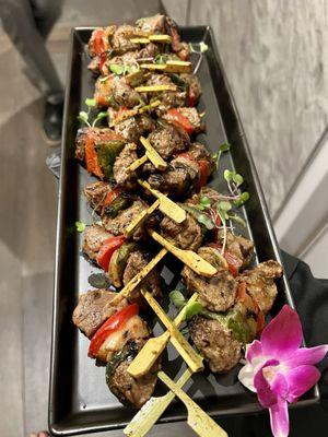 Mini beef kabob passed hors doeuvres.