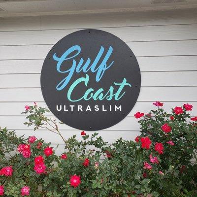 These flowers sure do bring out the best in our Gulf Coast UltraSlim sign!