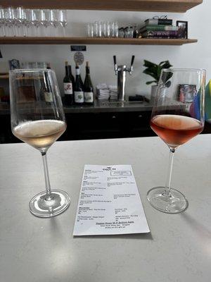 Two glasses of wine with the menu