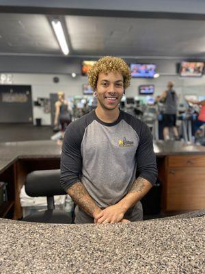 Friendly front desk staff ready to help you on your fitness journey.