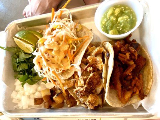 Fish taco, el metro taco, and al pastor taco