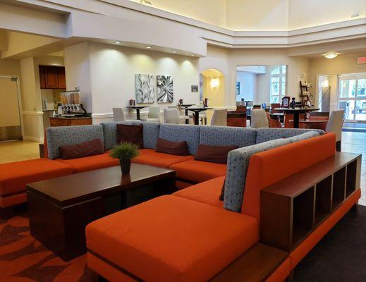 In the lobby and looking towards the tables for breakfast and also the evening meeting area