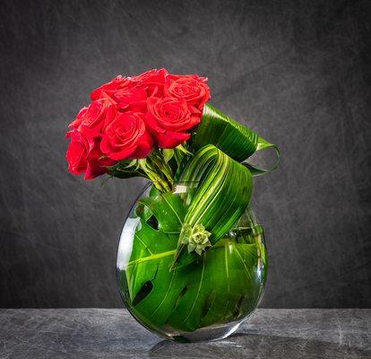 Reinventing the red rose arrangement --- professionally and securely delivered throughout Miami Dade