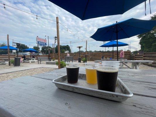 Flight on the patio, fire pit and warmers are nearby with lots of seating and corn hole for fun