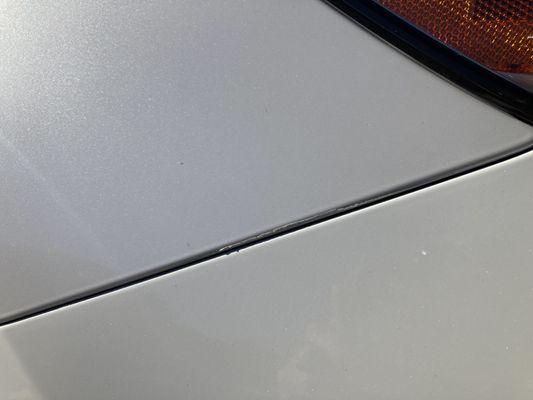 Paint ripple on the seam of the hood.