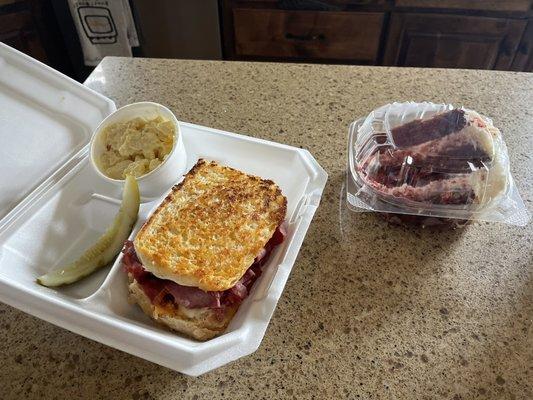 Grilled sourdough, corned beef, provolone, and thousand Island dressing. The best potato salad! And one delicious slice of red velvet cake.