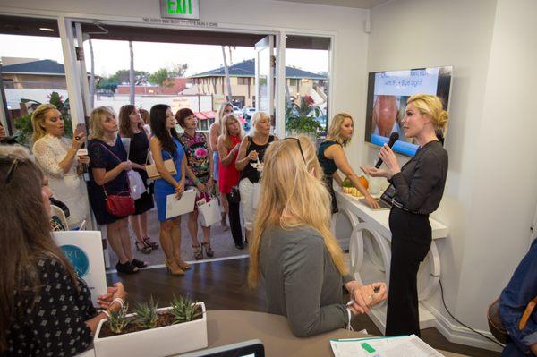 Dr. Palm lectures about some amazing treatments at the Summer Skin Rescue Event