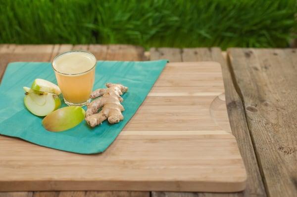 Enjoy an Organic Wheat Grass or Apple Ginger Shot from the Juice Bar