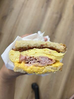 Egg, Bacon, Ham & Cheese Sandwich