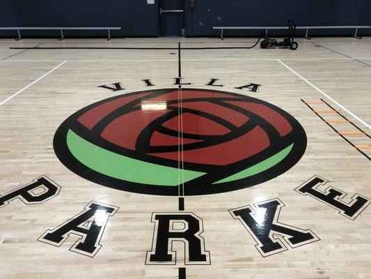 The basketball gym's floor has been refinished.