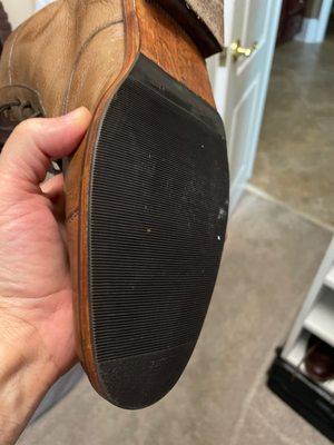 Replacement sole and stitched underneath.