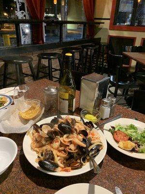 Fettuccine fruta di mare! House salad, garlic bread, olives, our BYOB!