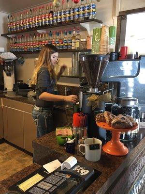 Sweet barista...yummy cinnamon rolls and delicious coffee!