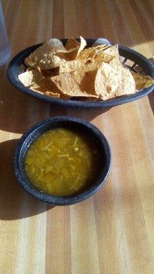 Nopalitos' chips and their famous warm green salsa.