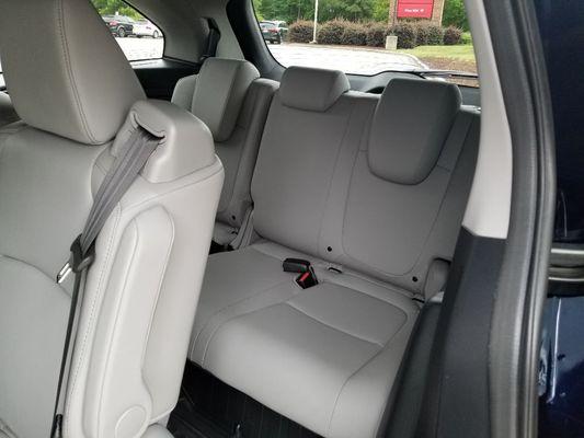 3rd row interior of one of automobiles. Very well maintained meticulously  Clean at all times.