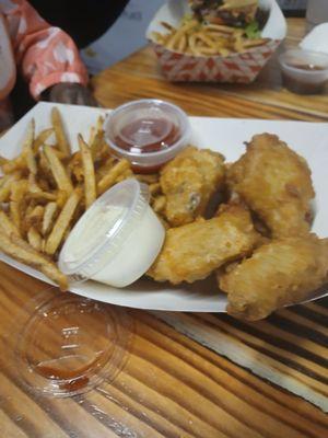 Breaded wings and fries