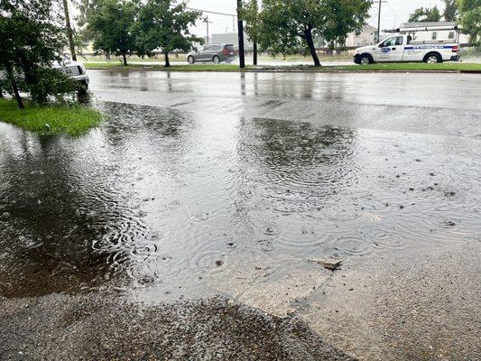 Flooded driveway because the streets were flooding.