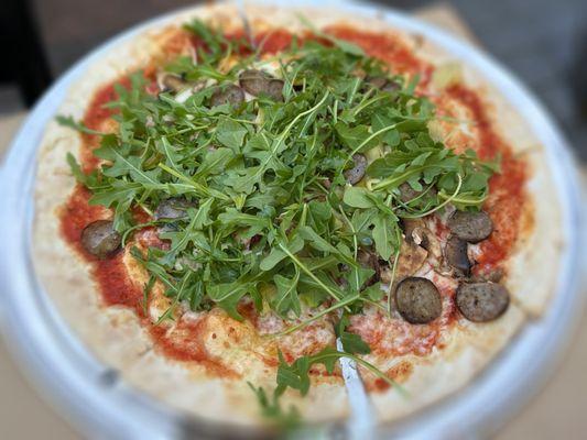 Pizza with sausage and arugula! Amazing!