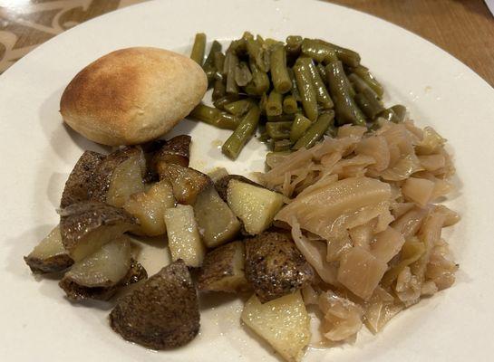 Green beans, steamed cabbage, roasted garlic potatoes and roll