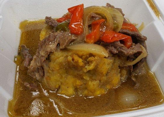 Mofongo con churrasco ($13): smashed plantains with skirt steak, peppers, and onions