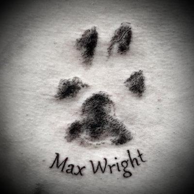 Pawprint memorial tattoo by Heather Pilapil.