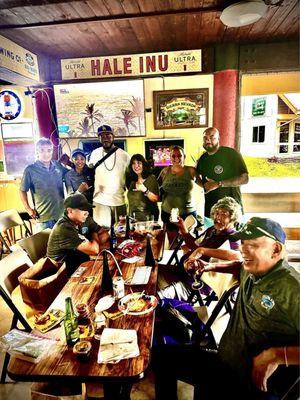 Us taking a picture with some of the local golfers that come in to the bar every Sunday to play their 19th hole.